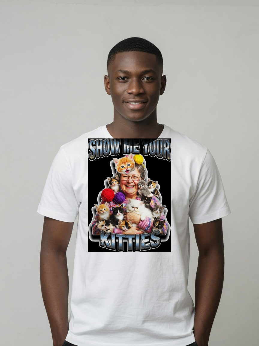 A real person wearing the Show Me Your Kitties t-shirt