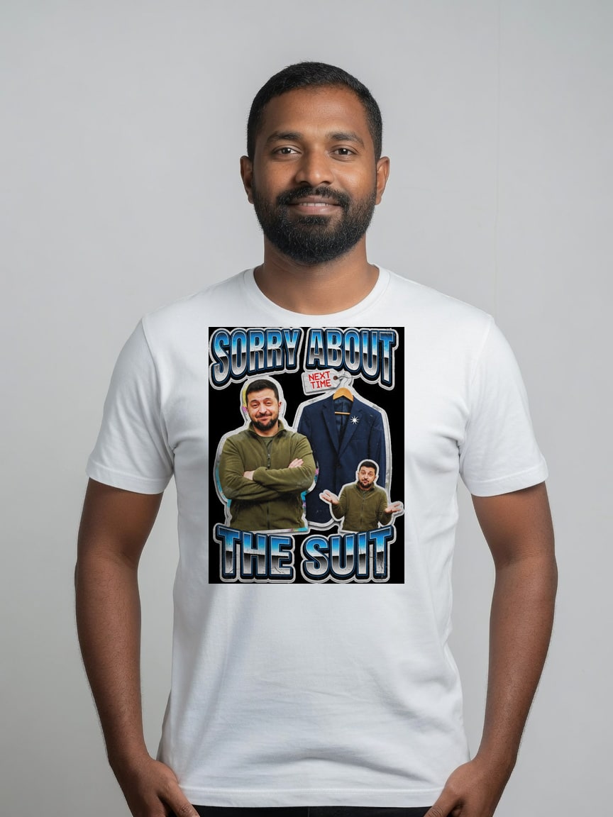 A real person wearing the The Suit Guy (Zelensky) t-shirt